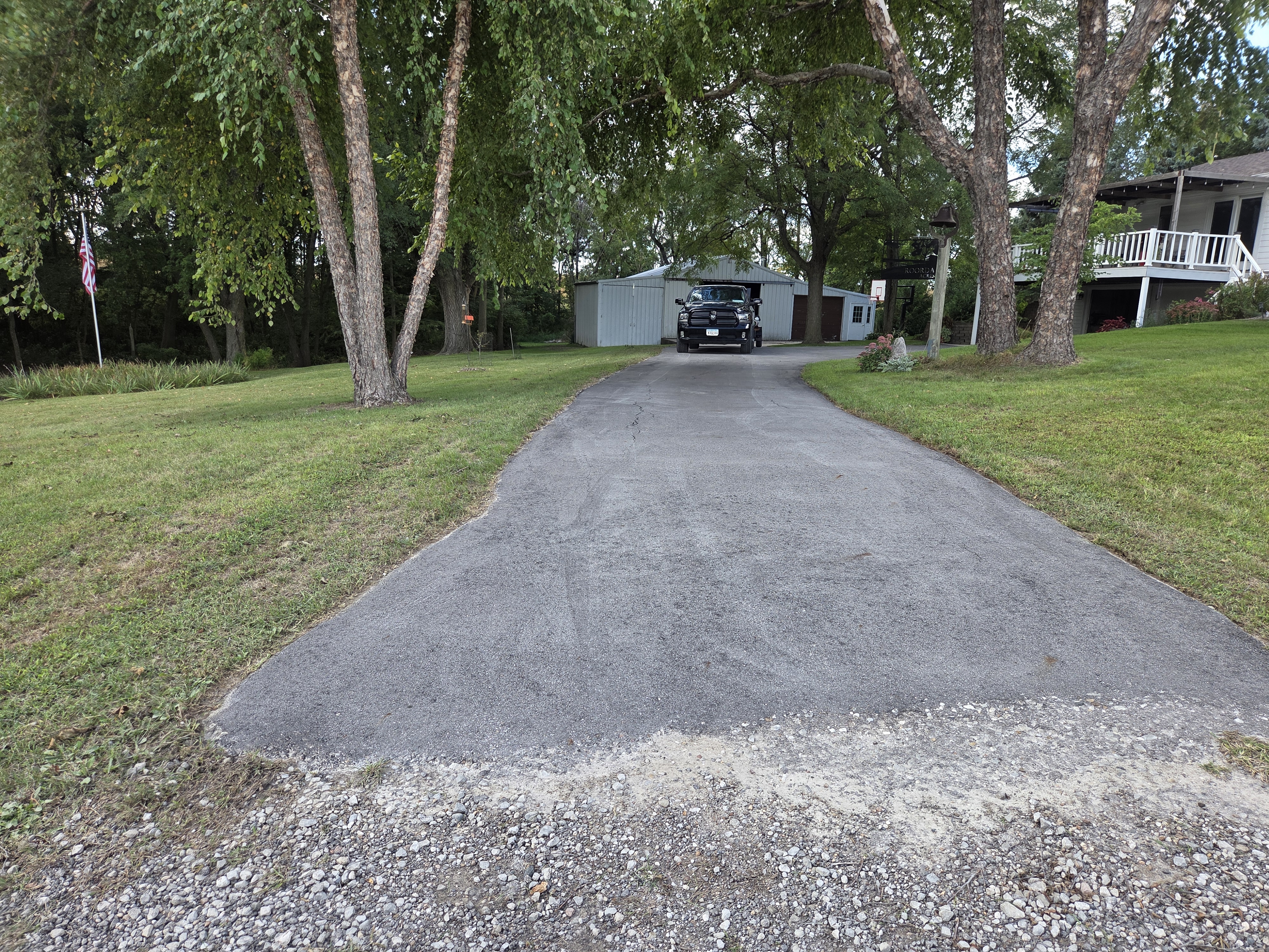 Fresh asphalt paving on a driveway