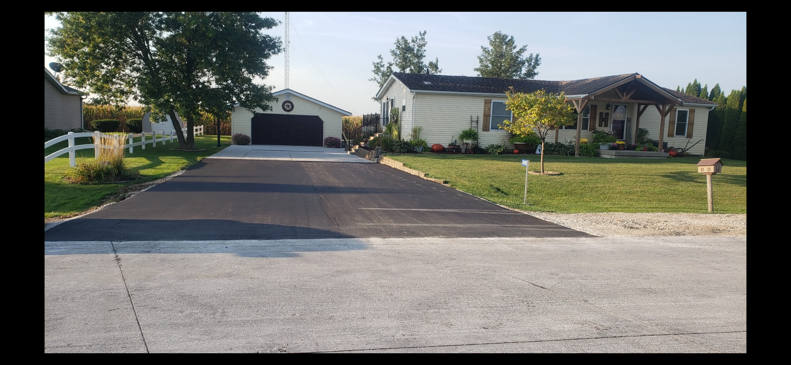 Fresh asphalt paving on a driveway